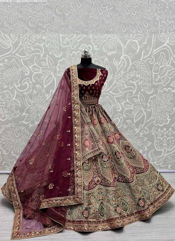 For A Designer Look,Grab These Lehenga Choli With 2 Dupatta in Fine Colored.These Lehenga And Choli Are Velvet And Dupatta Are Fabricated On Soft Net & Soft Net Pair.Its Beautified With Designer Fancy Patch Work,Multy Thread Embroidery,Zarkan Diamond Work.