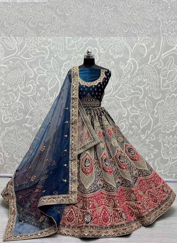 For A Designer Look,Grab These Lehenga Choli With 2 Dupatta in Fine Colored.These Lehenga And Choli Are Velvet And Dupatta Are Fabricated On Soft Net & Soft Net Pair.Its Beautified With Designer Fancy Patch Work,Multy Thread Embroidery,Zarkan Diamond Work.