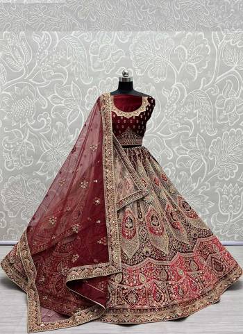 For A Designer Look,Grab These Lehenga Choli With 2 Dupatta in Fine Colored.These Lehenga And Choli Are Velvet And Dupatta Are Fabricated On Soft Net & Soft Net Pair.Its Beautified With Designer Fancy Patch Work,Multy Thread Embroidery,Zarkan Diamond Work.