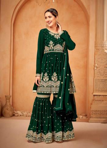 Grab These Designer Sharara Suit in Fine Colored Pair With Bottom And Dupatta.These Top And Dupatta Are Fabricated On Faux Georgette Pair With Faux Georgette Bottom.Its Beautified With Santoon Inner.Its Beautified With Heavy Designer Embroidery Work.