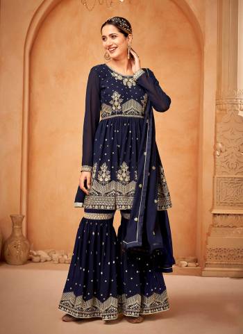 Grab These Designer Sharara Suit in Fine Colored Pair With Bottom And Dupatta.These Top And Dupatta Are Fabricated On Faux Georgette Pair With Faux Georgette Bottom.Its Beautified With Santoon Inner.Its Beautified With Heavy Designer Embroidery Work.