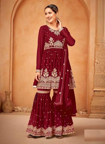 Grab These Designer Sharara Suit in Fine Colored Pair With Bottom And Dupatta.These Top And Dupatta Are Fabricated On Faux Georgette Pair With Faux Georgette Bottom.Its Beautified With Santoon Inner.Its Beautified With Heavy Designer Embroidery Work.