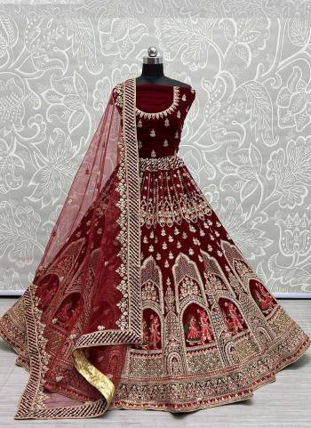 For A Designer Look,Grab These Lehenga Choli With Dupatta in Fine Colored.These Lehenga And Choli Are Velvet And Dupatta Are Fabricated On Soft Net Pair.Its Beautified With Designer Fancy Multy Thread Embroidery,Zarkan Diamond Work.