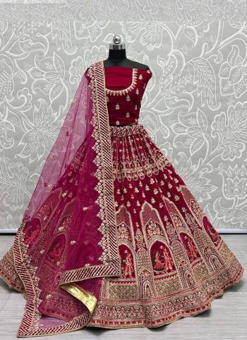 For A Designer Look,Grab These Lehenga Choli With Dupatta in Fine Colored.These Lehenga And Choli Are Velvet And Dupatta Are Fabricated On Soft Net Pair.Its Beautified With Designer Fancy Multy Thread Embroidery,Zarkan Diamond Work.