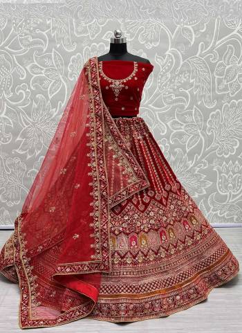 For A Designer Look,Grab These Lehenga Choli With Dupatta in Fine Colored.These Lehenga And Choli Are Velvet And Dupatta Are Fabricated On Soft Net Pair.Its Beautified With Designer Fancy Multy Thread Embroidery,Zarkan Diamond Work.