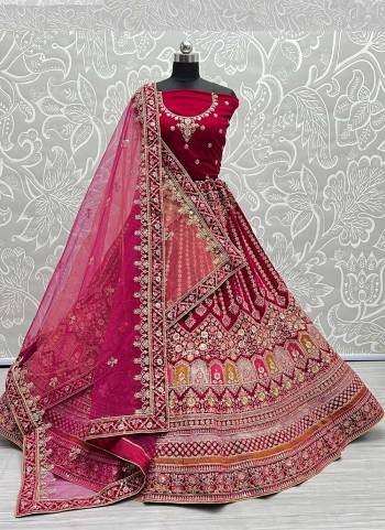 For A Designer Look,Grab These Lehenga Choli With Dupatta in Fine Colored.These Lehenga And Choli Are Velvet And Dupatta Are Fabricated On Soft Net Pair.Its Beautified With Designer Fancy Multy Thread Embroidery,Zarkan Diamond Work.