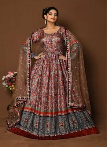 For A Designer Look,Grab These Readymade Gown With Dupatta in Fine Colored.These Gown Are Fabricated On Dola Silk Pair With Net Dupatta.Its Beautified With Designer Digital Printed With Sequance Embroidery Work.