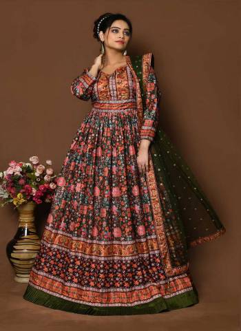 For A Designer Look,Grab These Readymade Gown With Dupatta in Fine Colored.These Gown Are Fabricated On Dola Silk Pair With Net Dupatta.Its Beautified With Designer Digital Printed With Sequance Embroidery Work.