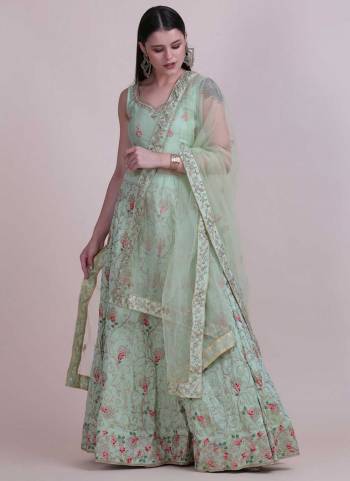 For A Designer Look,Grab These Lehenga Choli in Fine Colored.These Lehenga Choli Are Taffeta Silk And Dupatta Are Fabricated On Net Pair.Its Beautified With Fancy Designer Embroidery Work.