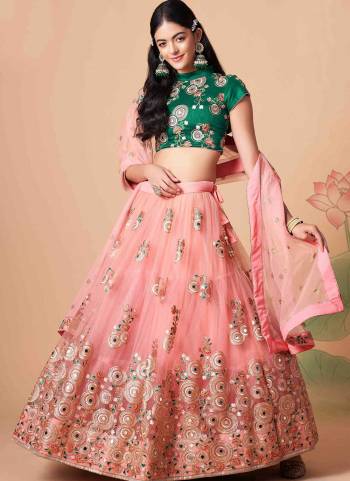 For A Designer Look,Grab These Lehenga Choli in Fine Colored.These Lehenga And Dupatta Are Fabricated On Soft Net Pair With Art Silk Blouse.Its Beautified With Designer Thread,Mirror,Dori,Sequance Embroidery Work.