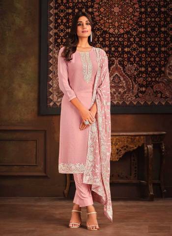 Attrective These Designer Salwar Suits in Fine Colored Pair With Dupatta.These Top And Dupatta Are Fabricated On Georgette Pair With Santoon Bottom.Its Beautified With Heavy Designer Embroidery With Swarovski Work.