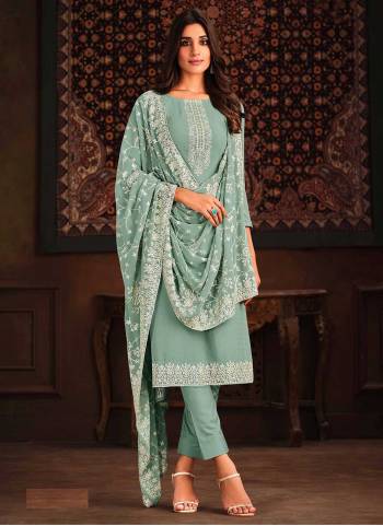 Attrective These Designer Salwar Suits in Fine Colored Pair With Dupatta.These Top And Dupatta Are Fabricated On Georgette Pair With Santoon Bottom.Its Beautified With Heavy Designer Embroidery With Swarovski Work.