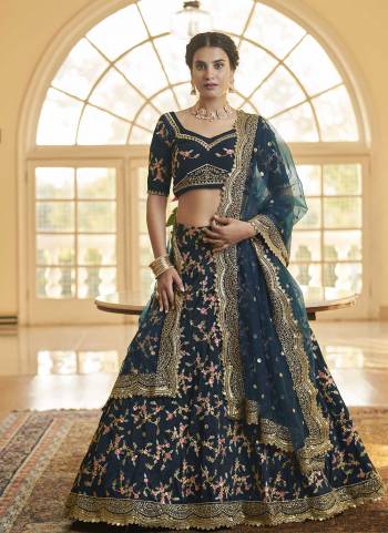 For A Designer Look,Grab These Lehenga Choli in Fine Colored.These Lehenga And Blouse Are Fabricated On Chinon Silk Pair With Butterfly Net Dupatta.Its Beautified With Heavy Thread,Sequance Embroidery Work.