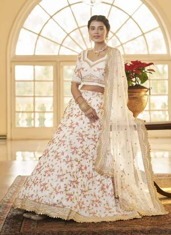 For A Designer Look,Grab These Lehenga Choli in Fine Colored.These Lehenga And Blouse Are Fabricated On Chinon Silk Pair With Butterfly Net Dupatta.Its Beautified With Heavy Thread,Sequance Embroidery Work.