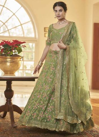 For A Designer Look,Grab These Lehenga Choli in Fine Colored.These Lehenga And Blouse Are Fabricated On Chinon Silk Pair With Butterfly Net Dupatta.Its Beautified With Heavy Thread,Sequance Embroidery Work.