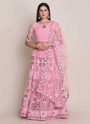 For A Designer Look,Grab These Lehenga Choli in Fine Colored.These Lehenga Choli Are Net And Dupatta Are Fabricated On Net Pair.Its Beautified With Fancy Designer Embroidery Work.