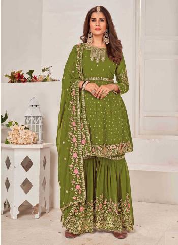 Grab These Sharara Suit in Fine Colored Pair With Bottom And Dupatta.These Top And Dupatta Are Fabricated On Faux Georgette Pair With Faux Georgette Bottom.Its Beautified With Heavy Designer Multy Thread,Sequance Embroidery Work.