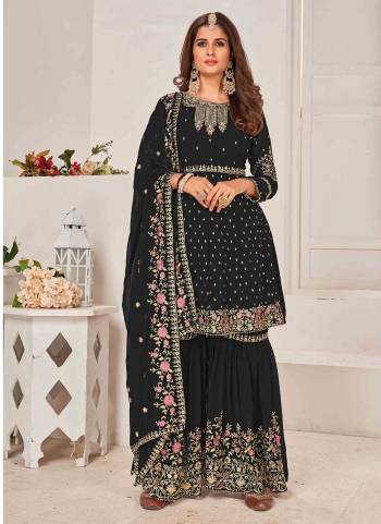 Grab These Sharara Suit in Fine Colored Pair With Bottom And Dupatta.These Top And Dupatta Are Fabricated On Faux Georgette Pair With Faux Georgette Bottom.Its Beautified With Heavy Designer Multy Thread,Sequance Embroidery Work.