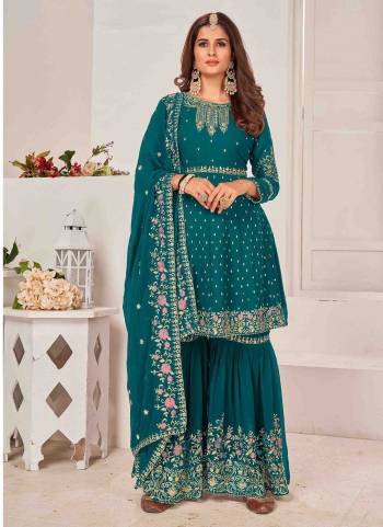 Grab These Sharara Suit in Fine Colored Pair With Bottom And Dupatta.These Top And Dupatta Are Fabricated On Faux Georgette Pair With Faux Georgette Bottom.Its Beautified With Heavy Designer Multy Thread,Sequance Embroidery Work.