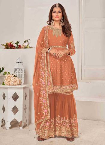 Grab These Sharara Suit in Fine Colored Pair With Bottom And Dupatta.These Top And Dupatta Are Fabricated On Faux Georgette Pair With Faux Georgette Bottom.Its Beautified With Heavy Designer Multy Thread,Sequance Embroidery Work.