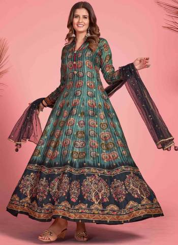 Grab These Readymade Gown in Fine Colored Pair With Dupatta.These Gown Are Fabricated On Soft Dola Silk Pair With Soft Net Dupatta.Its Beautified With Micro Cotton Inner.Its Beautified With Designer Kalamkari Printed With Embroidery Work.