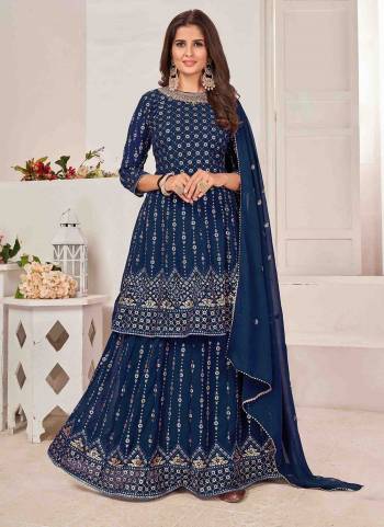 Grab These Sharara Suit in Fine Colored Pair With Bottom And Dupatta.These Top And Dupatta Are Fabricated On Faux Georgette Pair With Faux Georgette Bottom.Its Beautified With Heavy Designer Multy Thread,Sequance Embroidery Work.