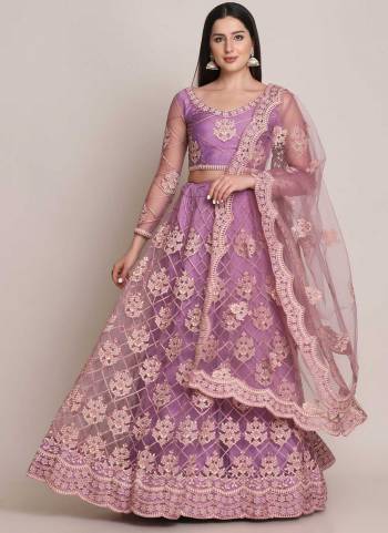 For A Designer Look,Grab These Lehenga Choli in Fine Colored.These Lehenga Choli Are Net And Dupatta Are Fabricated On Net Pair.Its Beautified With Fancy Designer Embroidery,Stone Work.