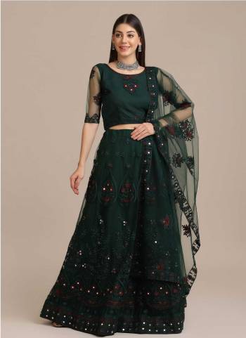 For A Designer Look,Grab These Lehenga Choli in Fine Colored.These Lehenga Choli Are Net And Dupatta Are Fabricated On Net Pair.Its Beautified With Fancy Designer Embroidery,Stone Work.