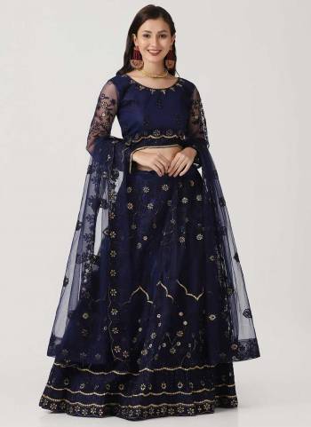 For A Designer Look,Grab These Lehenga Choli in Fine Colored.These Lehenga Choli Are Net And Dupatta Are Fabricated On Net Pair.Its Beautified With Fancy Designer Embroidery,Stone Work.