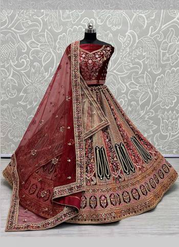 For A Designer Look,Grab These Lehenga Choli With 2 Dupatta in Fine Colored.These Lehenga And Choli Are Velvet And Dupatta Are Fabricated On Soft Net Pair.Its Beautified With Designer Fancy Patch Work,Multy Thread Embroidery,Zarkan Diamond Work.