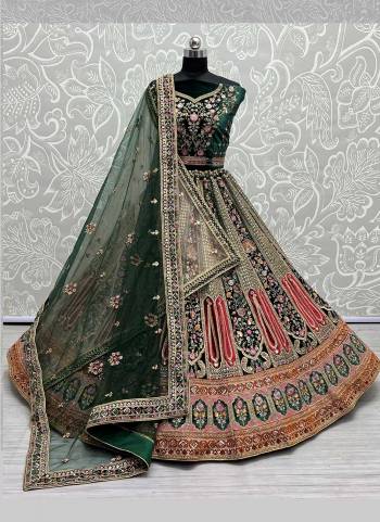 For A Designer Look,Grab These Lehenga Choli With 2 Dupatta in Fine Colored.These Lehenga And Choli Are Velvet And Dupatta Are Fabricated On Soft Net Pair.Its Beautified With Designer Fancy Patch Work,Multy Thread Embroidery,Zarkan Diamond Work.