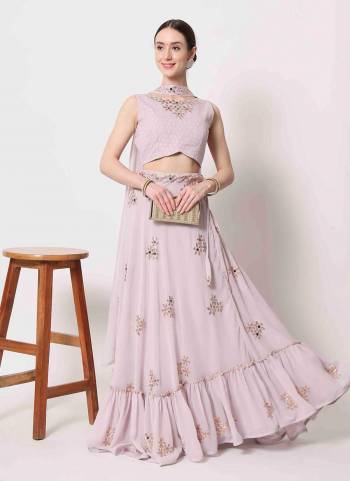 For A Designer Look,Grab These Lehenga Choli in Fine Colored.These Lehenga And Blouse Are Fabricated On Georgette Pair With Georgette Dupatta.Its Beautified With Designer Embroidery Work.