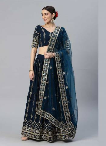 For A Designer Look,Grab These Lehenga Choli in Fine Colored.These Lehenga And Blouse Are Fabricated On Faux Georgette Pair With Net Dupatta.Its Beautified With Sequance Embroidery Work.