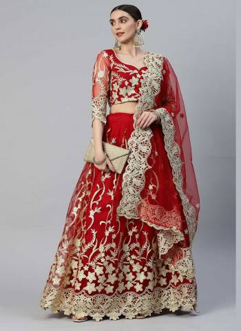 Heavy Designer Lehenga Choli In Yellow Color Fabricated On Net Beautified With Heavy Attractive Embroidery. 