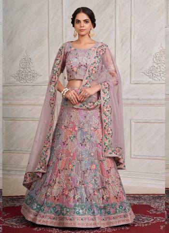 For A Designer Look,Grab These Lehenga Choli in Fine Colored.These Lehenga And Dupatta Are Fabricated On Soft Net Pair With Soft Net Blouse.Its Beautified With Heavy Designer Embroidery Work.