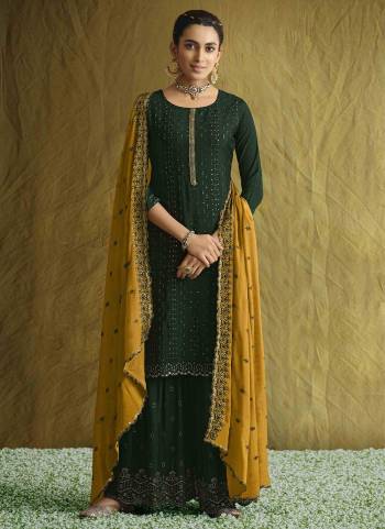 Grab These Plazzo Suit in Fine Colored Pair With Bottom And Dupatta.These Top And Dupatta Are Fabricated On Chinon Pair With Chinon Bottom.Its Beautified With Heavy Designer Sequance Embroidery Work.