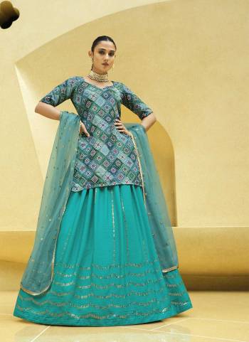 A Designer Look,Grab These Lehenga Choli With Dupatta in Fine Colored.These Lehenga Are Chinon Silk And Blouse Are Fabricated On Art Silk Pair With Net Dupatta.Its Beautified With Designer Printed,Sequance Embroidery Work.