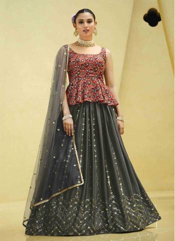 A Designer Look,Grab These Lehenga Choli With Dupatta in Fine Colored.These Lehenga Are Chinon Silk And Blouse Are Fabricated On Art Silk Pair With Net Dupatta.Its Beautified With Designer Printed,Sequance Embroidery Work.