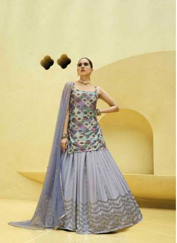 A Designer Look,Grab These Lehenga Choli With Dupatta in Fine Colored.These Lehenga Are Chinon Silk And Blouse Are Fabricated On Art Silk Pair With Net Dupatta.Its Beautified With Designer Printed,Sequance Embroidery Work.