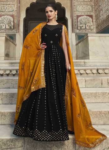 Grab These Beautiful Looking Designer Gown With Dupatta.These Gown is Georgette And Dupatta Is Fabricated On Shimmer.Its Beautified With Designer Thread And Sequance Embroidery Work.