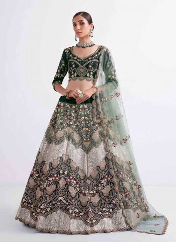 For A Designer Look,Grab These Lehenga Choli in Fine Colored.These Lehenga And Blouse Are Fabricated On Silk Pair With Soft Net Dupatta.Its Beautified With Designer Thread,Sequance Embroidery,Zarkan Hand Work.