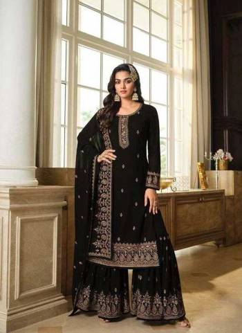 Attrective These Sharara Suit in Fine Colored Pair With Bottom And Dupatta.These Top And Bottom Are Faux Georgette And Pair With Faux Georgette Dupatta.Its Beautified With Heavy Designer Embroidery Work.