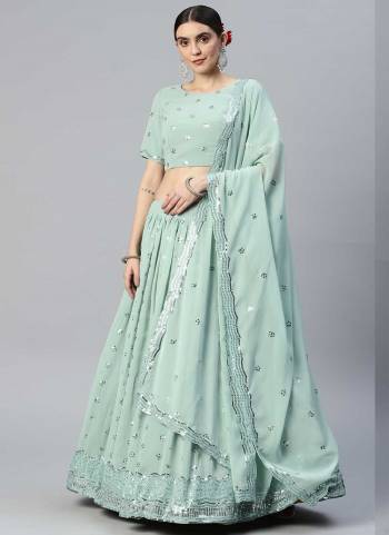 A Designer Look,Grab These Lehenga Choli in Fine Colored.These Lehenga And Blouse Are Fabricated On Georgette Pair With Georgette Dupatta.Its Beautified With Thread,Sequance Embroidery Work.