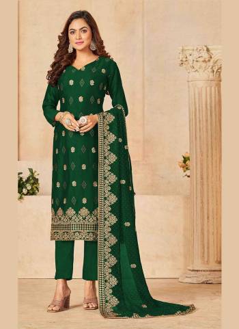 Grab These Suit in Fine Colored Pair With Bottom And Dupatta.These Top And Dupatta Are Fabricated On Vichitra Silk Pair With Dull Santoon Bottom.Its Beautified With Blooming Color,Heavy Designer Embroidery Work.