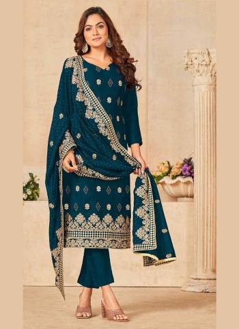 Grab These Suit in Fine Colored Pair With Bottom And Dupatta.These Top And Dupatta Are Fabricated On Vichitra Silk Pair With Dull Santoon Bottom.Its Beautified With Blooming Color,Heavy Designer Embroidery Work.