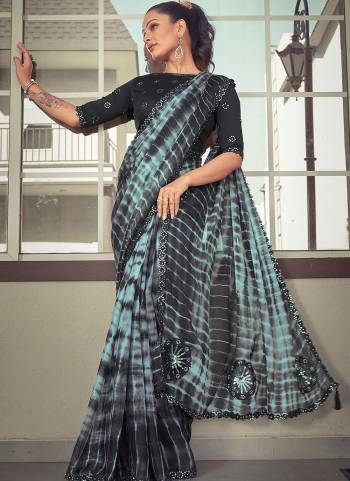 Look Attrective These Designer Party Wear Saree in Fine Colored.These Saree Are Crepe Georgette And Blouse is Fabricated On Taffeta.Its Beautified With Printed,Embroidery Work.