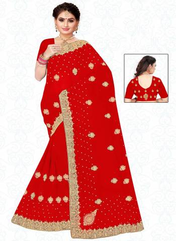 Garb These Wedding Wear Saree in Fine Red Colored.These Saree And Blouse is Fabricated On Heavy Georgette.Its Beautified With Heavy Jari Embroidery With Diamond Work.