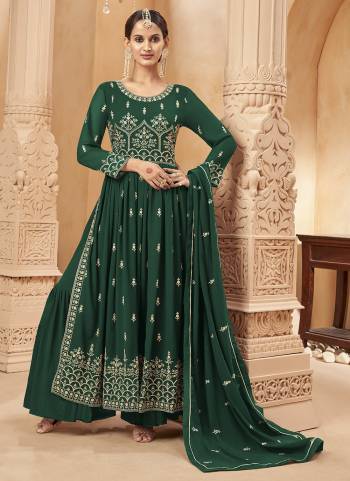 Grab These Sharara Suit in Fine Colored Pair With Bottom And Dupatta.These Top And Dupatta Are Fabricated On Faux Georgette Pair With Faux Georgette Bottom.Its Beautified With Santoon Inner.Its Beautified With Designer Heavy Embroidery Work.