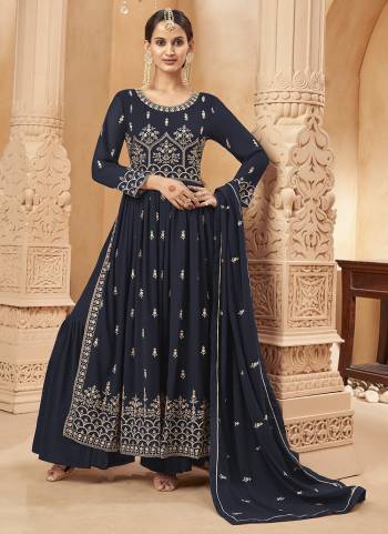 Grab These Sharara Suit in Fine Colored Pair With Bottom And Dupatta.These Top And Dupatta Are Fabricated On Faux Georgette Pair With Faux Georgette Bottom.Its Beautified With Santoon Inner.Its Beautified With Designer Heavy Embroidery Work.