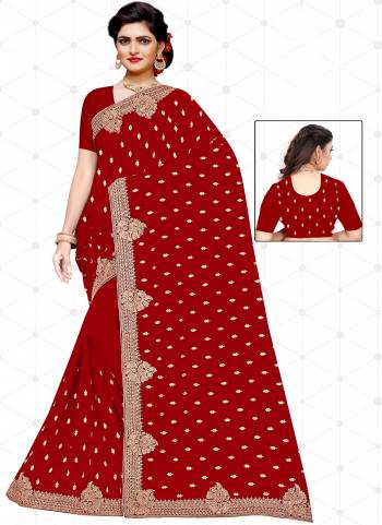 Garb These Wedding Wear Saree in Fine Red Colored.These Saree And Blouse is Fabricated On Heavy Georgette.Its Beautified With Heavy Jari Embroidery With Diamond Work.